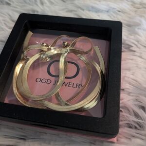 Long Bow Gold Earrings